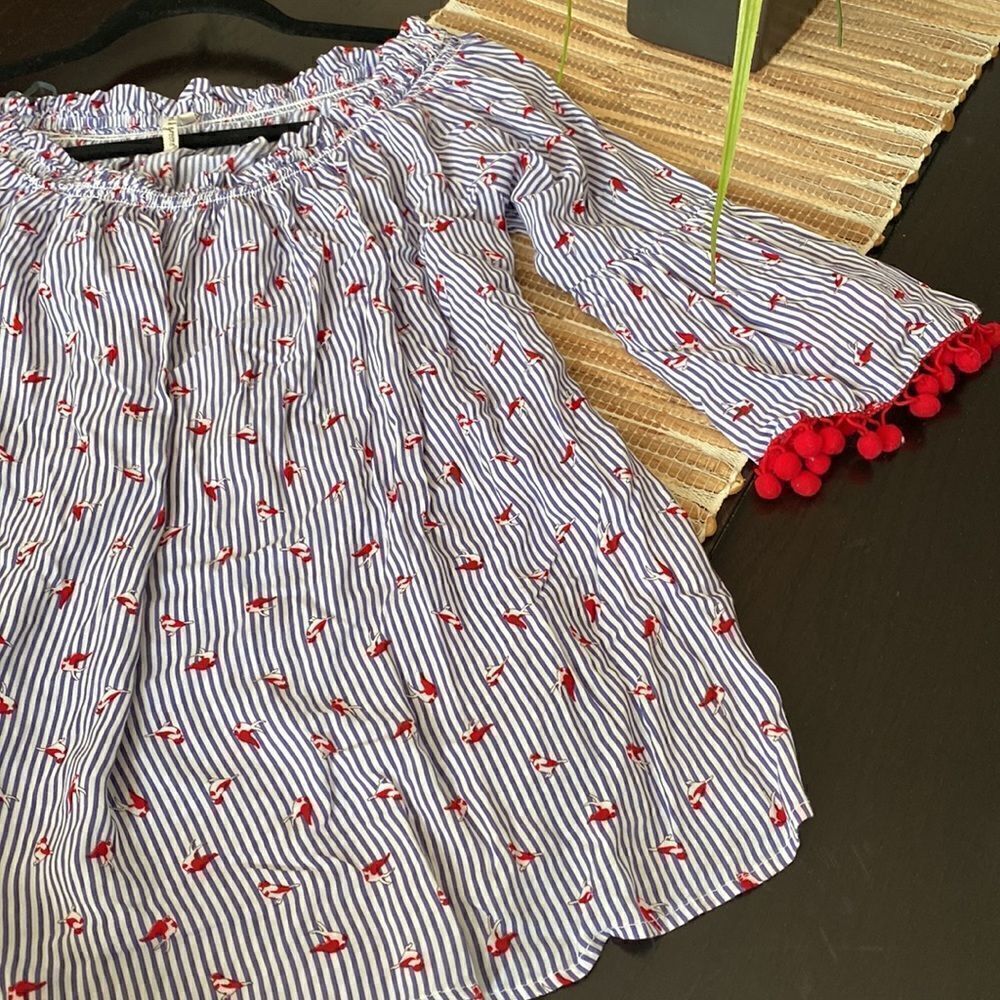 Can be worn on or off shoulder. XL boho style. 100% rayon